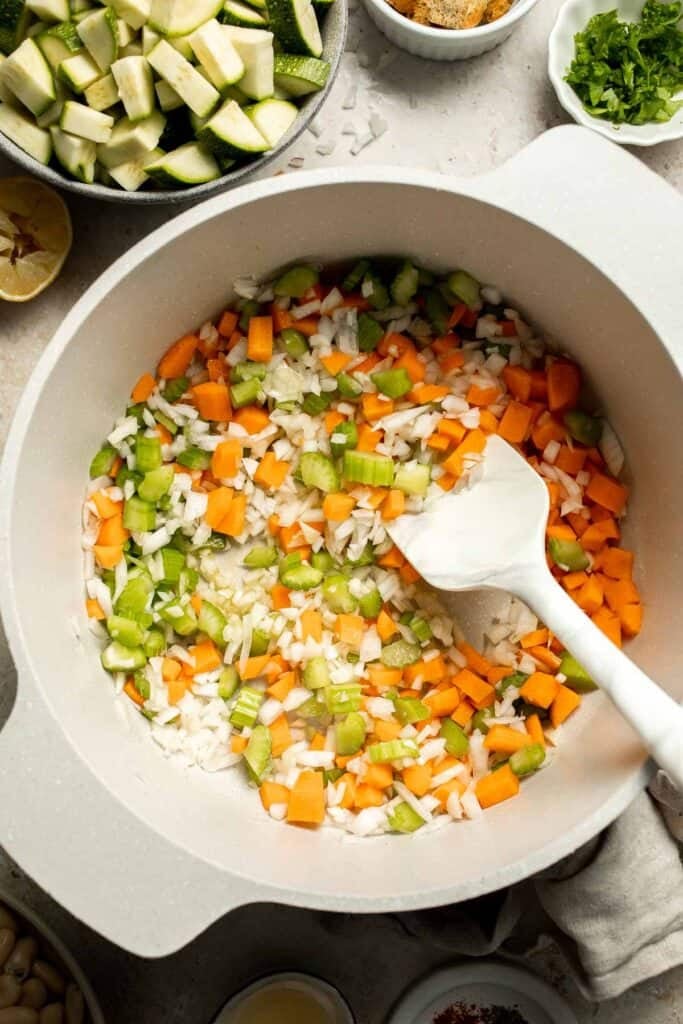 This Creamy Zucchini Soup is made without using cream (using secret ingredient white beans!). It's smooth, healthy, flavorful, vegan, and dairy-free. | aheadofthyme.com