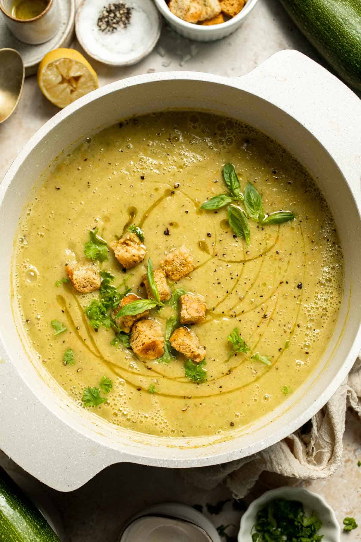 This Creamy Zucchini Soup is made without using cream (using secret ingredient white beans!). It's smooth, healthy, flavorful, vegan, and dairy-free. | aheadofthyme.com