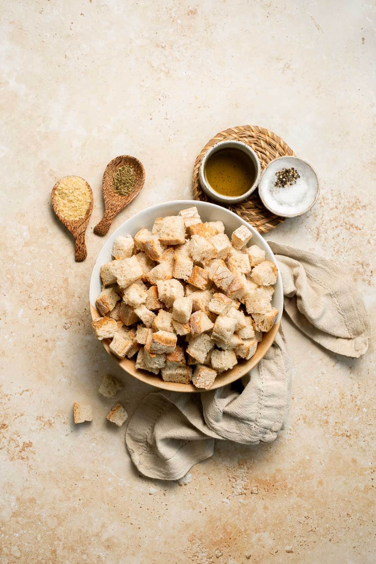 Looking for a simple and delicious way to use up leftover bread? Try this easy homemade croutons recipe that will elevate any salad or soup. | aheadofthyme.com