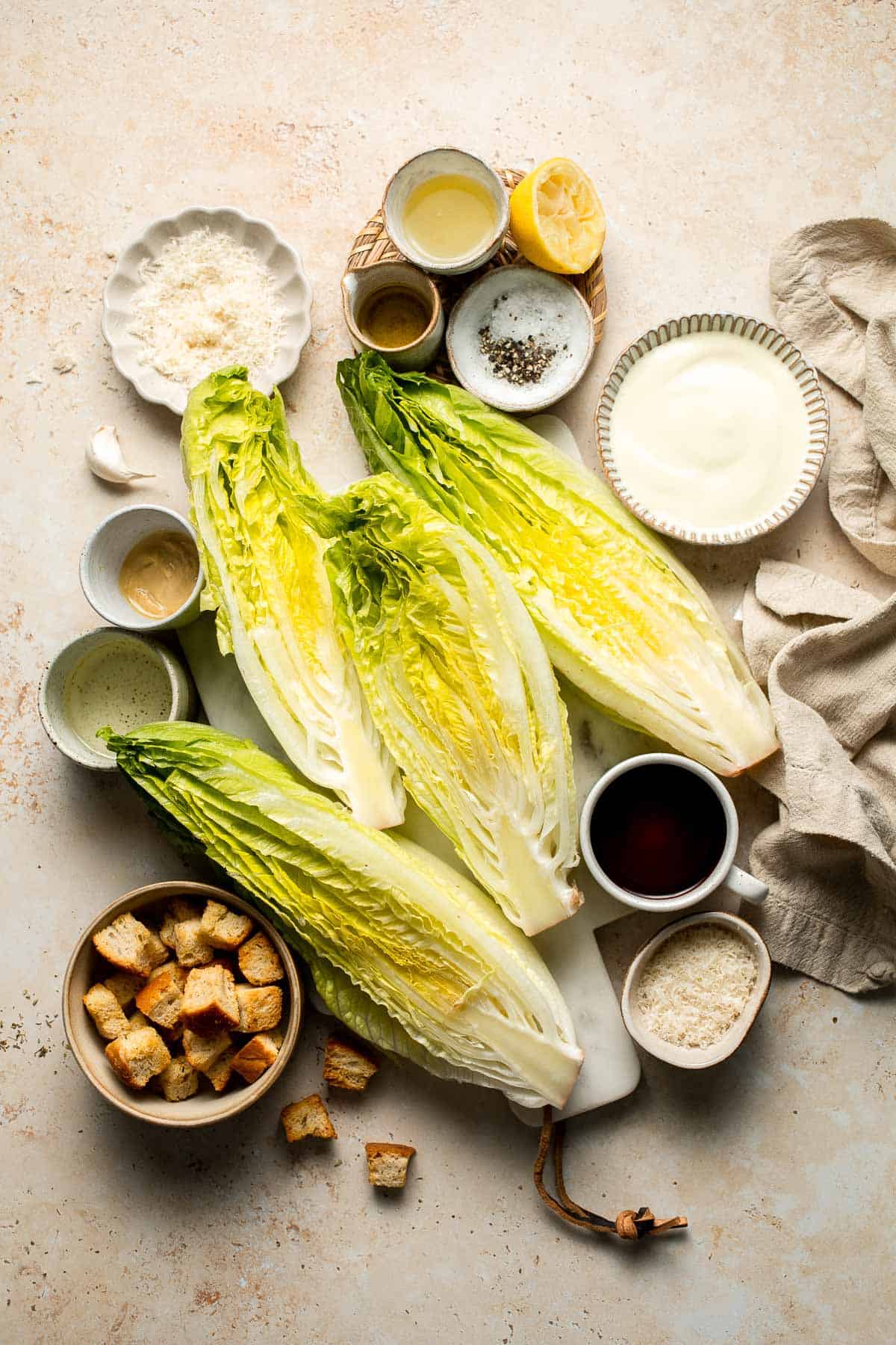 Elevate your salad game with this grilled romaine Caesar salad and homemade dressing. The smoky flavor from grilling the lettuce adds a unique twist. | aheadofthyme.com