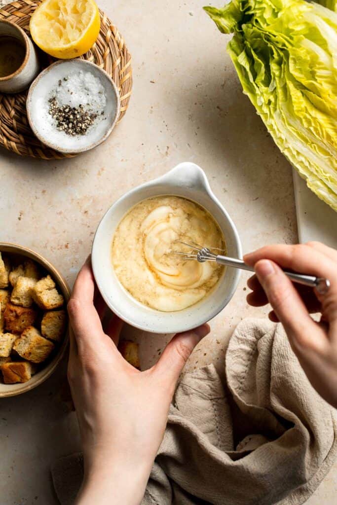 Elevate your salad game with this grilled romaine Caesar salad and homemade dressing. The smoky flavor from grilling the lettuce adds a unique twist. | aheadofthyme.com