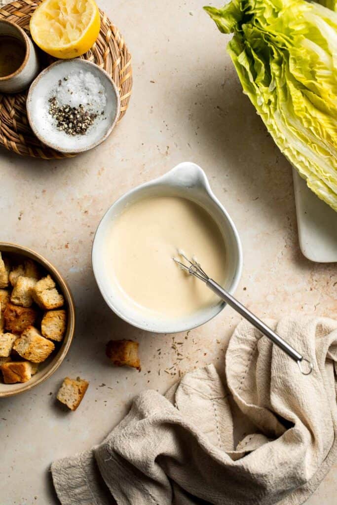 Elevate your salad game with this grilled romaine Caesar salad and homemade dressing. The smoky flavor from grilling the lettuce adds a unique twist. | aheadofthyme.com