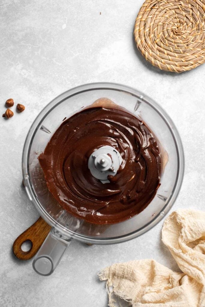 Skip the store-bought version and make your own homemade Nutella with this easy recipe. A chocolate hazelnut spread that is creamy, quick, and ready in 20! | aheadofthyme.com