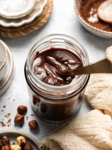 Skip the store-bought version and make your own homemade Nutella with this easy recipe. A chocolate hazelnut spread that is creamy, quick, and ready in 20! | aheadofthyme.com