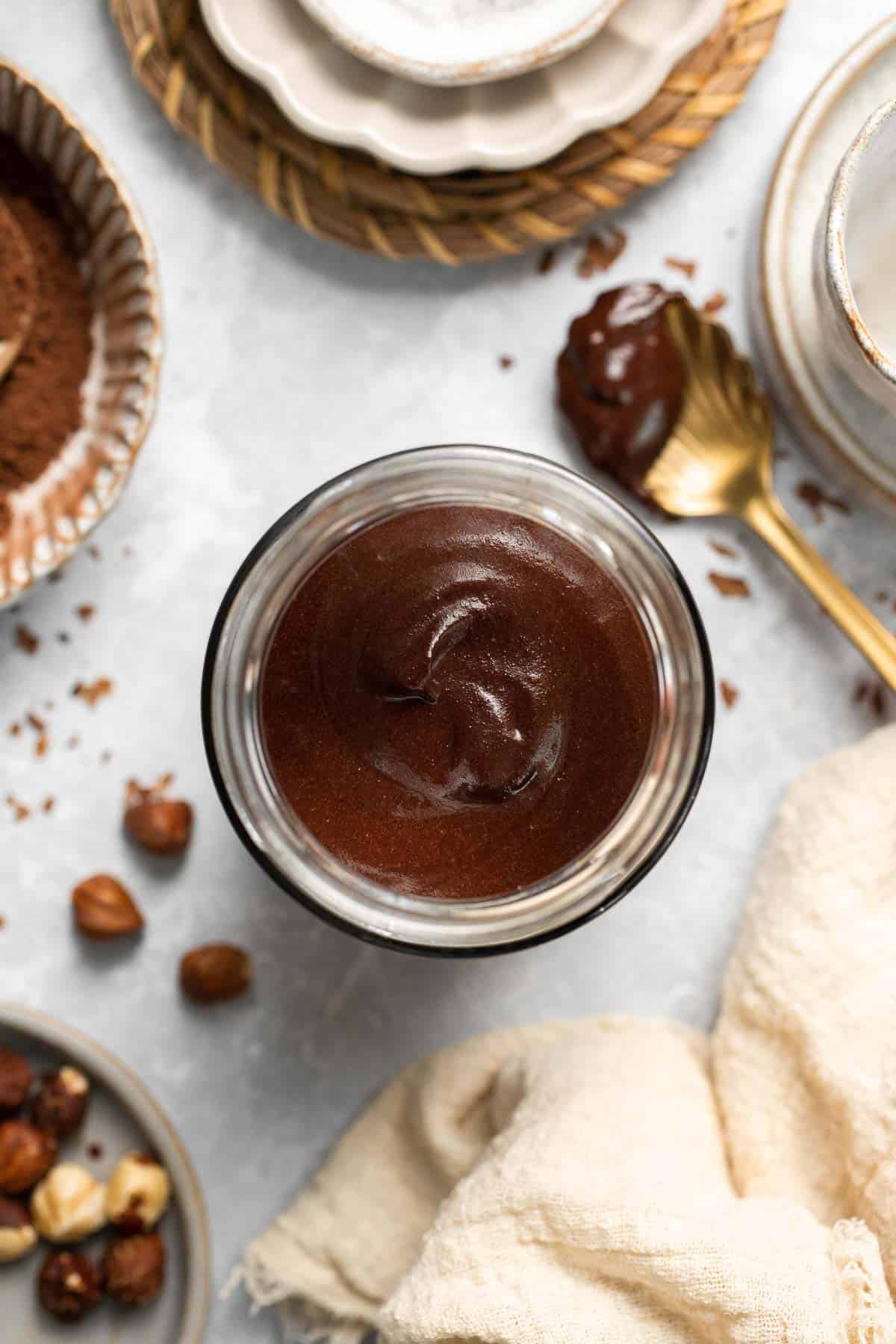 Skip the store-bought version and make your own homemade Nutella with this easy recipe. A chocolate hazelnut spread that is creamy, quick, and ready in 20! | aheadofthyme.com