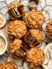 Delicious, protein-packed peanut butter muffins with a crunchy streusel topping are perfect for breakfast or as a midday snack. Soft, fluffy, and tasty! | aheadofthyme.com