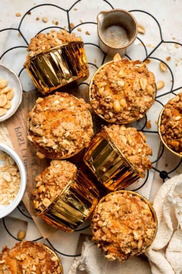 Delicious, protein-packed peanut butter muffins with a crunchy streusel topping are perfect for breakfast or as a midday snack. Soft, fluffy, and tasty! | aheadofthyme.com