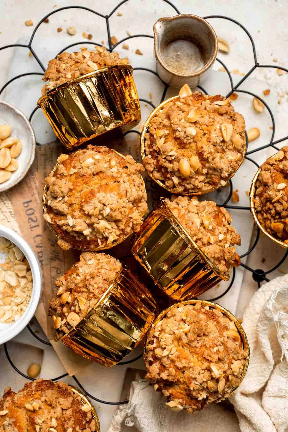 Delicious, protein-packed peanut butter muffins with a crunchy streusel topping are perfect for breakfast or as a midday snack. Soft, fluffy, and tasty! | aheadofthyme.com