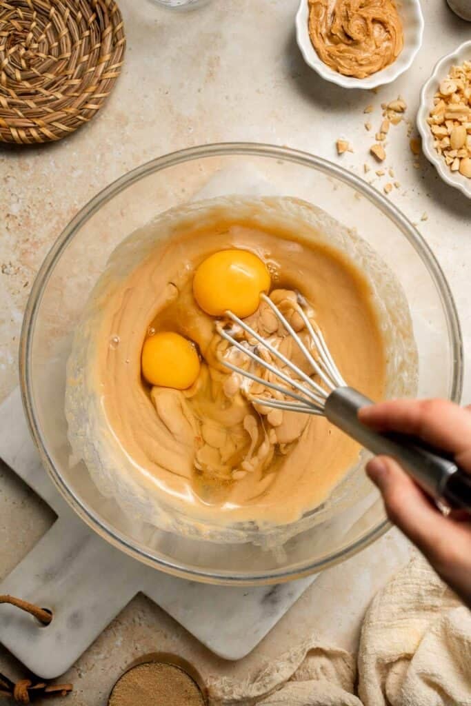 Delicious, protein-packed peanut butter muffins with a crunchy streusel topping are perfect for breakfast or as a midday snack. Soft, fluffy, and tasty! | aheadofthyme.com