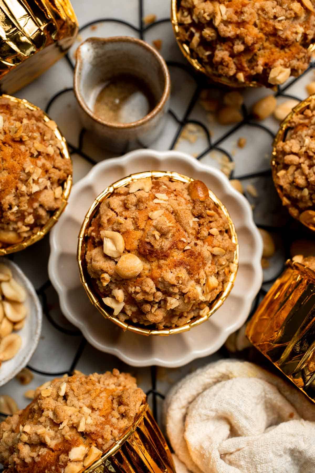 Delicious, protein-packed peanut butter muffins with a crunchy streusel topping are perfect for breakfast or as a midday snack. Soft, fluffy, and tasty! | aheadofthyme.com