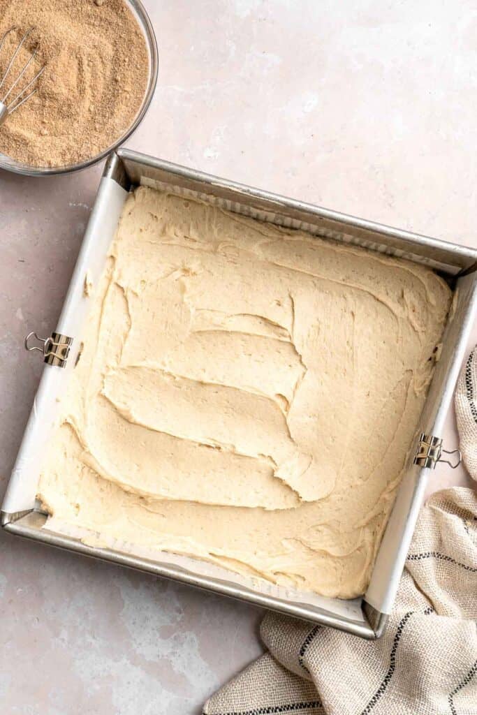 This sour cream coffee cake with cinnamon swirl is soft, buttery, and topped with crunchy streusel and vanilla glaze. Perfect for brunch or dessert. | aheadofthyme.com