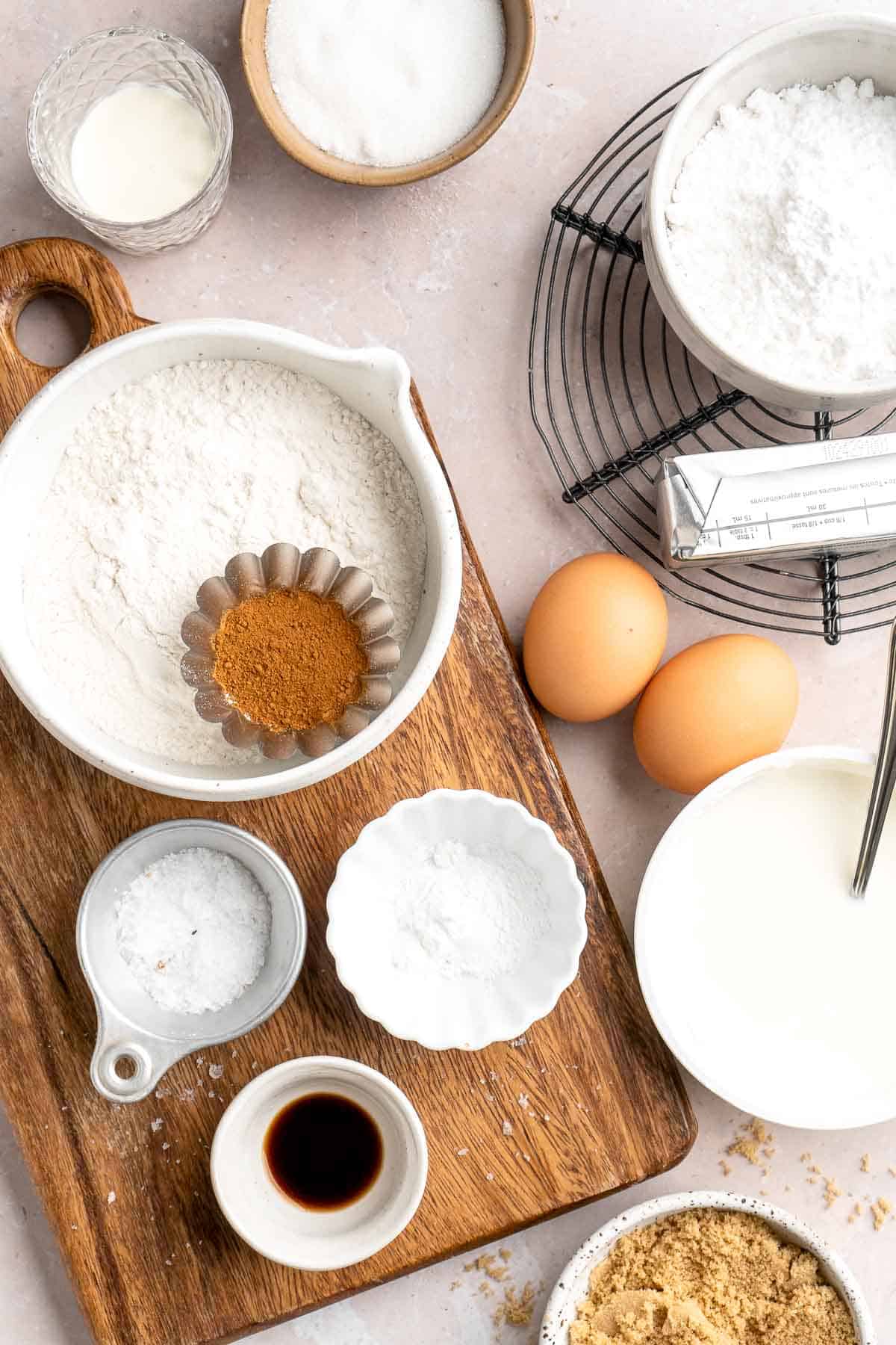 This sour cream coffee cake with cinnamon swirl is soft, buttery, and topped with crunchy streusel and vanilla glaze. Perfect for brunch or dessert. | aheadofthyme.com