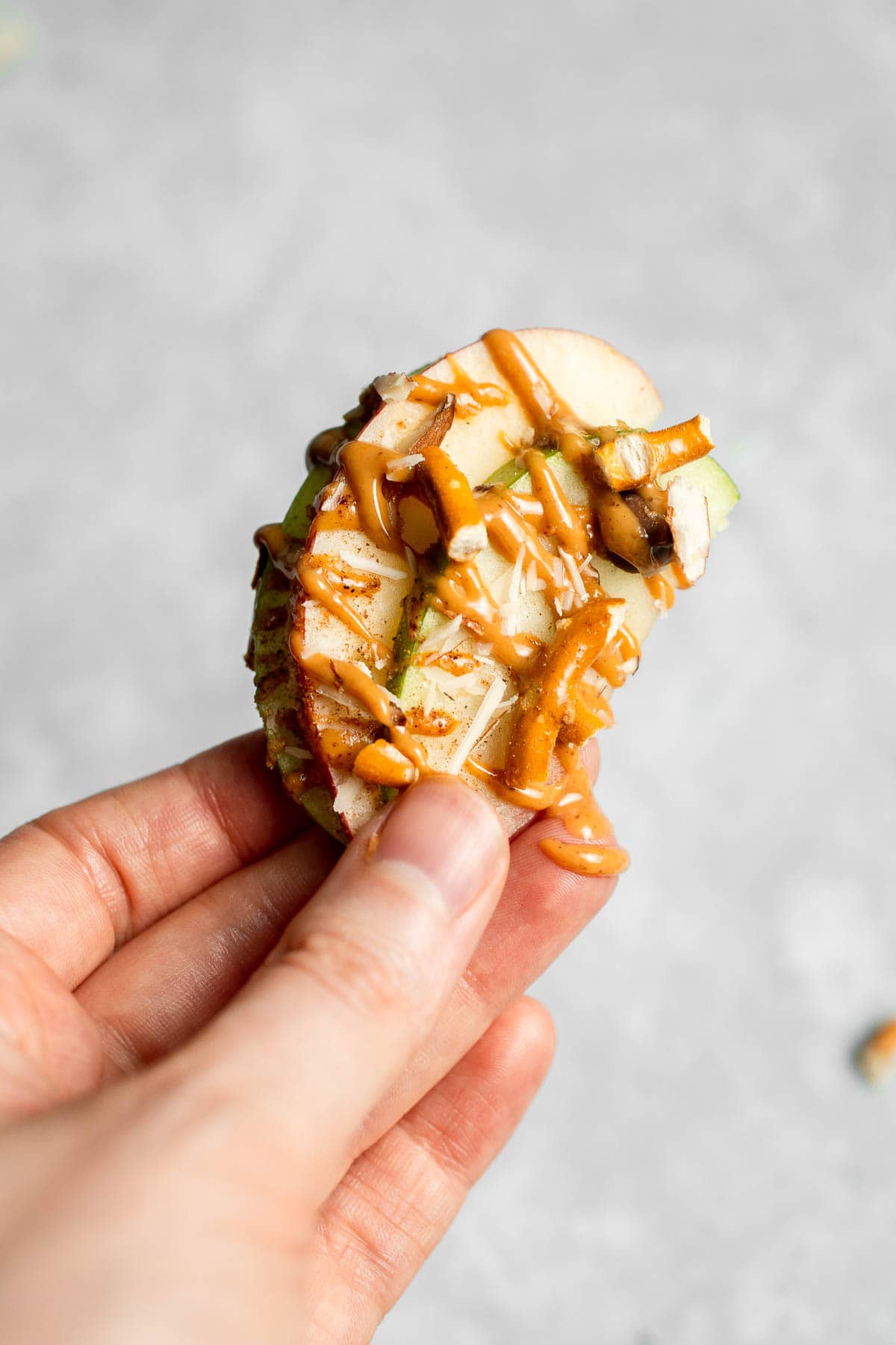 Apple Nachos are a quick, healthy snack made with crisp apples, nut butter, and toppings. Fun, customizable, and ready in minutes! | aheadofthyme.com