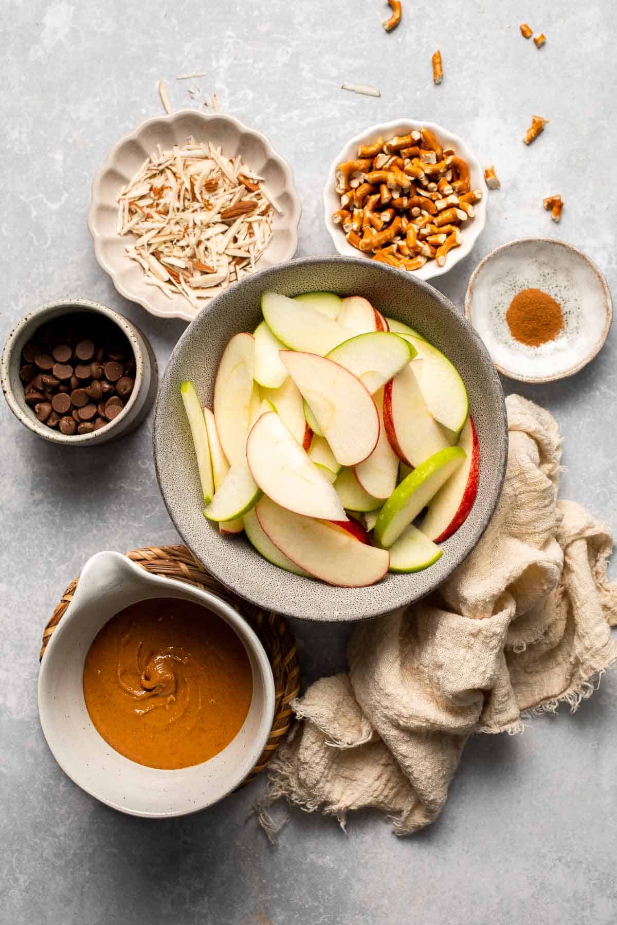 Apple Nachos are a quick, healthy snack made with crisp apples, nut butter, and toppings. Fun, customizable, and ready in minutes! | aheadofthyme.com