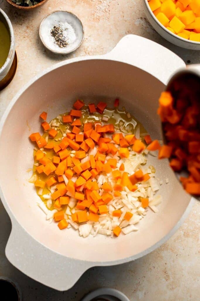 Enjoy a cozy bowl of butternut squash lentil soup, packed with protein, fiber, and nutrients. This hearty recipe makes the ultimate plant-based meal. | aheadofthyme.com