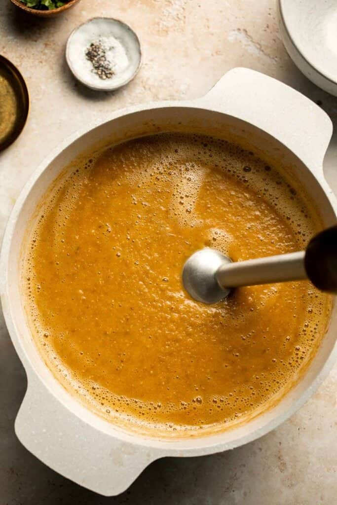 Enjoy a cozy bowl of butternut squash lentil soup, packed with protein, fiber, and nutrients. This hearty recipe makes the ultimate plant-based meal. | aheadofthyme.com