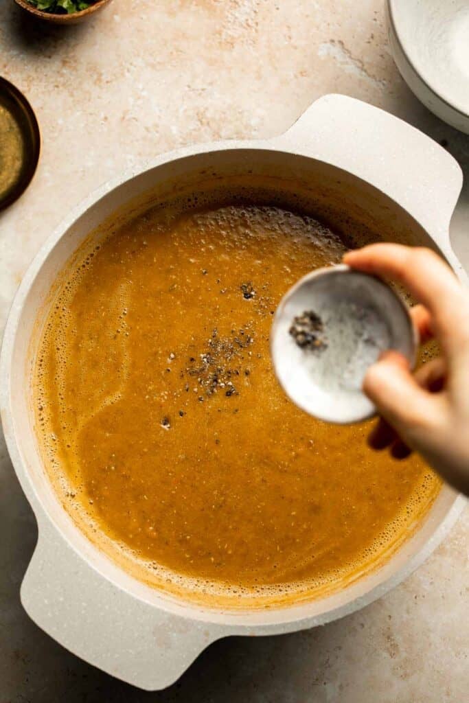 Enjoy a cozy bowl of butternut squash lentil soup, packed with protein, fiber, and nutrients. This hearty recipe makes the ultimate plant-based meal. | aheadofthyme.com