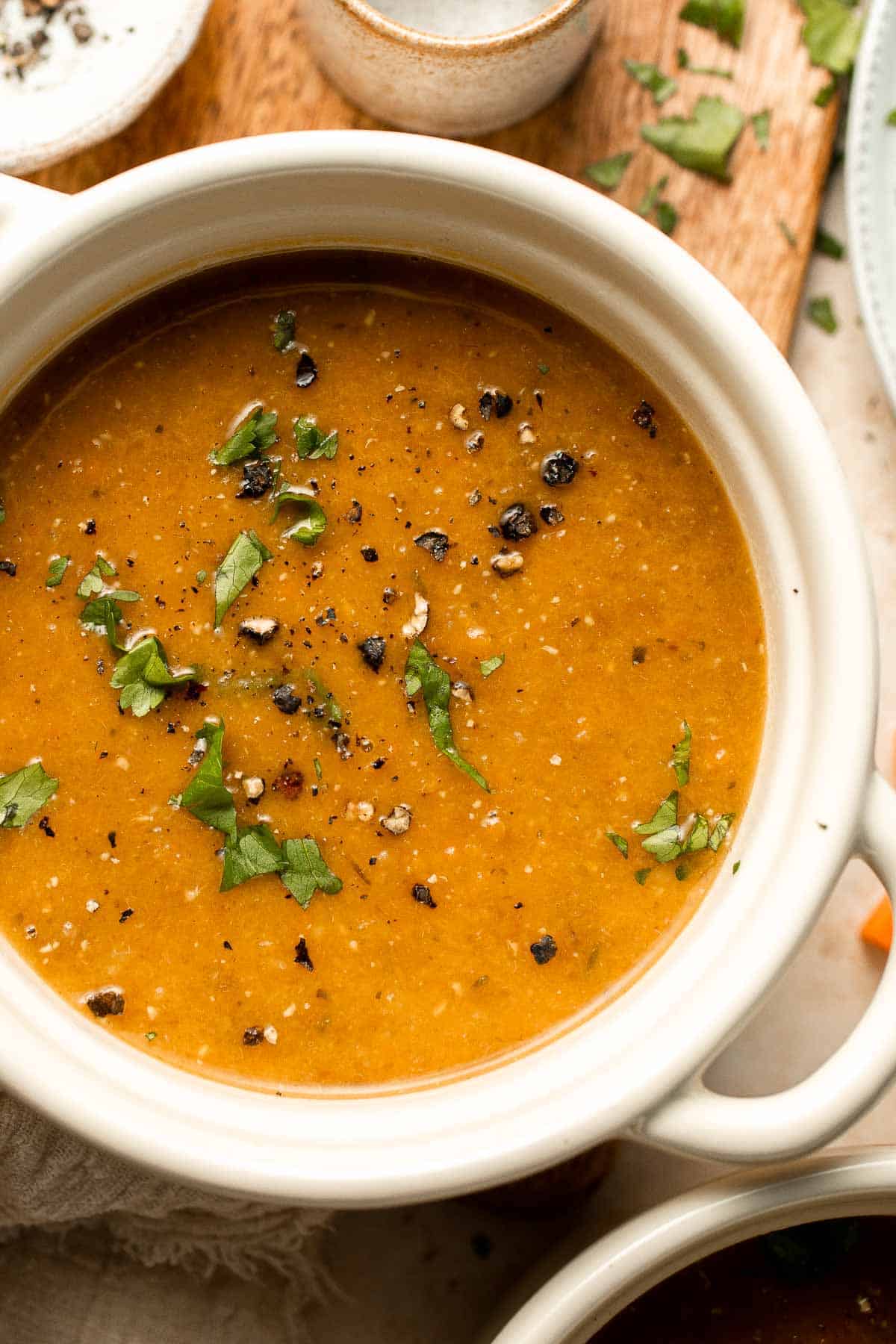 Enjoy a cozy bowl of butternut squash lentil soup, packed with protein, fiber, and nutrients. This hearty recipe makes the ultimate plant-based meal. | aheadofthyme.com