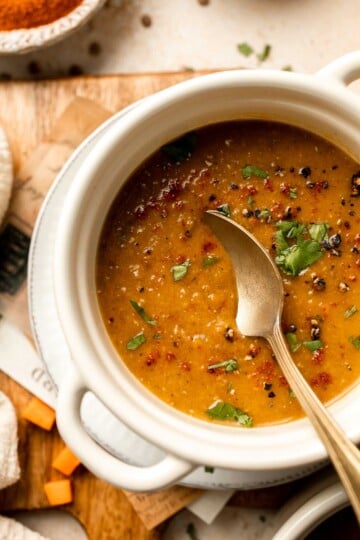 Enjoy a cozy bowl of butternut squash lentil soup, packed with protein, fiber, and nutrients. This hearty recipe makes the ultimate plant-based meal. | aheadofthyme.com