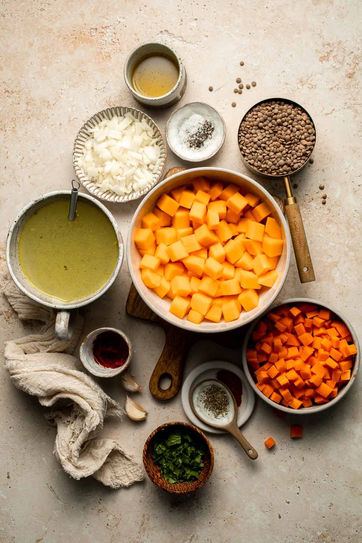 Enjoy a cozy bowl of butternut squash lentil soup, packed with protein, fiber, and nutrients. This hearty recipe makes the ultimate plant-based meal. | aheadofthyme.com