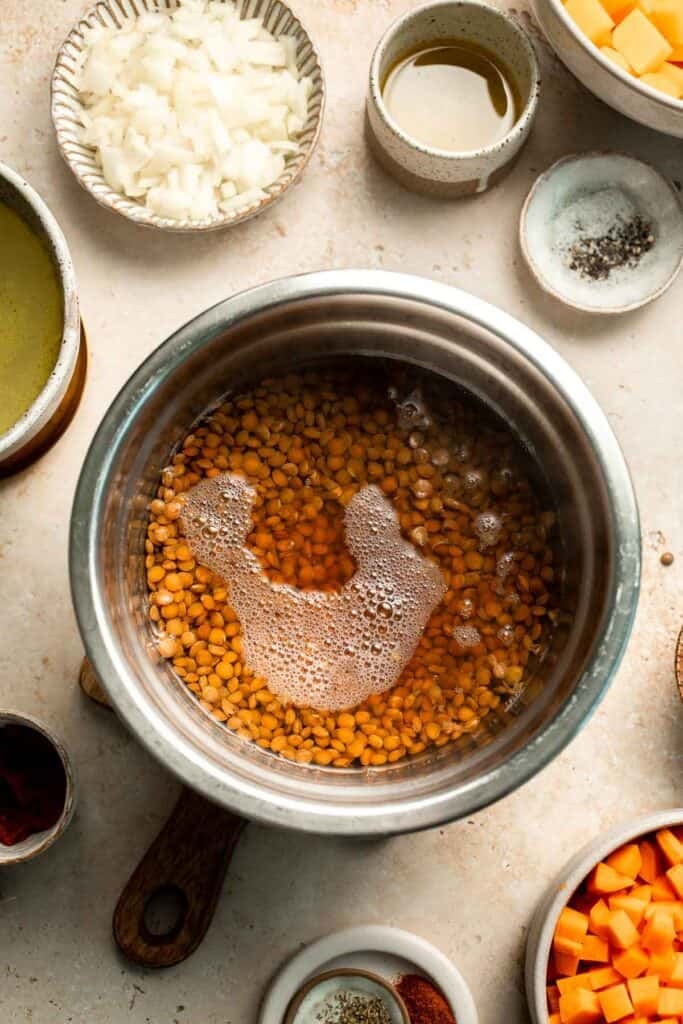 Enjoy a cozy bowl of butternut squash lentil soup, packed with protein, fiber, and nutrients. This hearty recipe makes the ultimate plant-based meal. | aheadofthyme.com