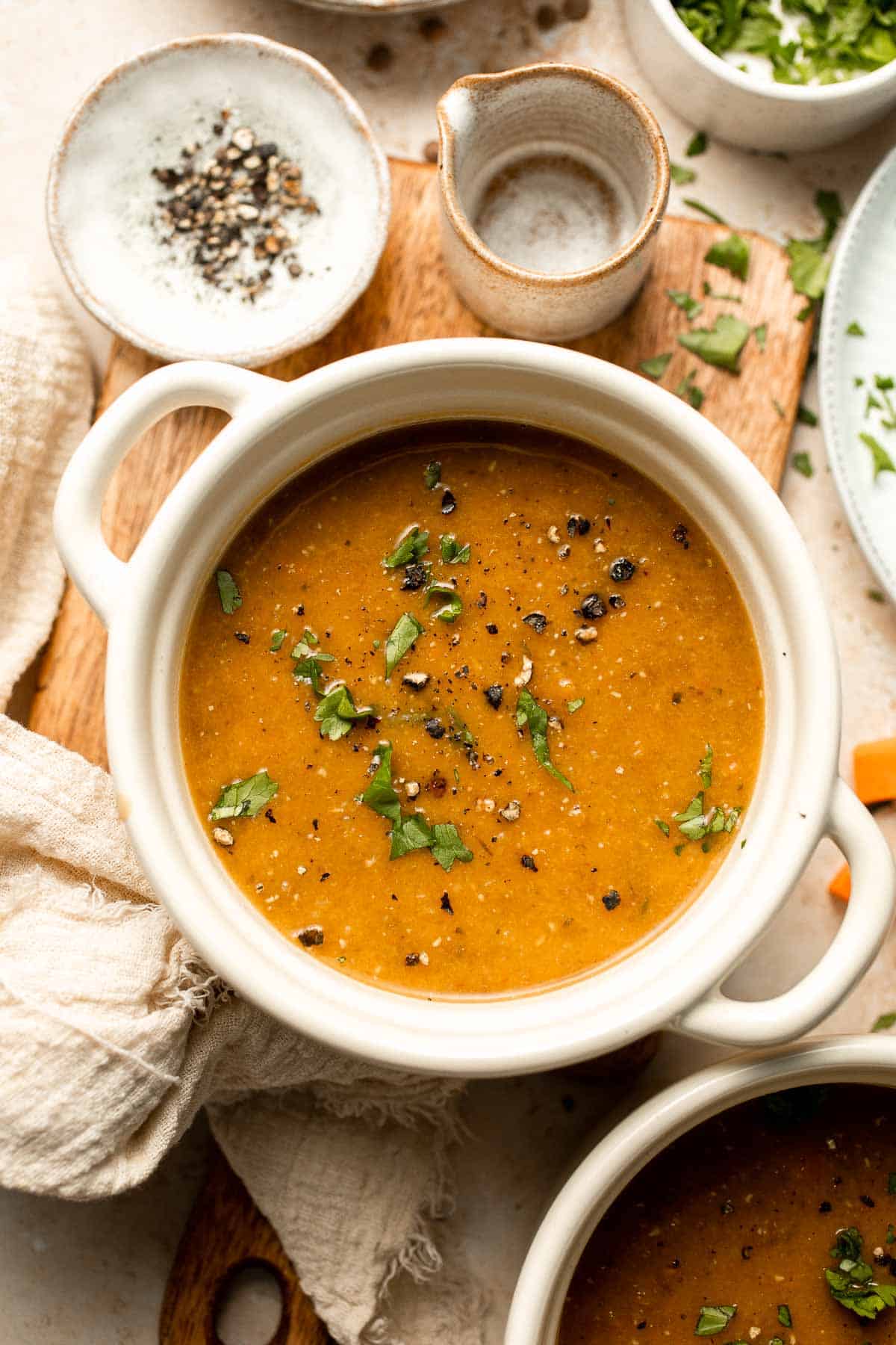 Enjoy a cozy bowl of butternut squash lentil soup, packed with protein, fiber, and nutrients. This hearty recipe makes the ultimate plant-based meal. | aheadofthyme.com