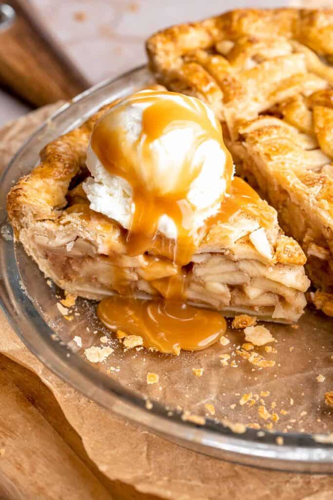 Homemade Caramel Apple Pie is warm, spiced, and gooey. A classic apple pie with caramel sauce baked inside for the ultimate fall dessert. | aheadofthyme.com