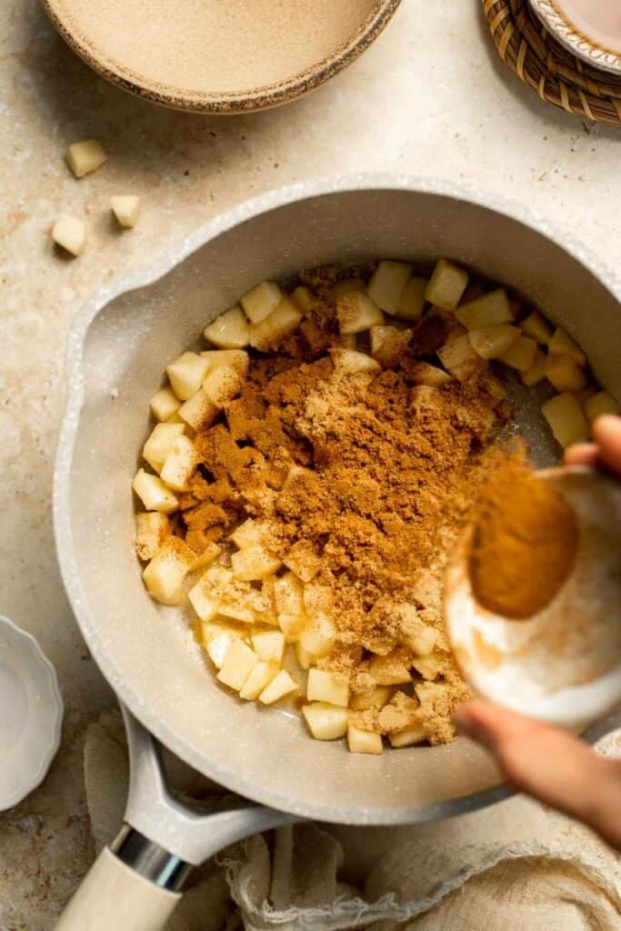Add a touch of sweetness to your breakfast or dessert with this easy caramelized apple topping recipe. Perfect for pancakes, waffles, ice cream, and more! | aheadofthyme.com