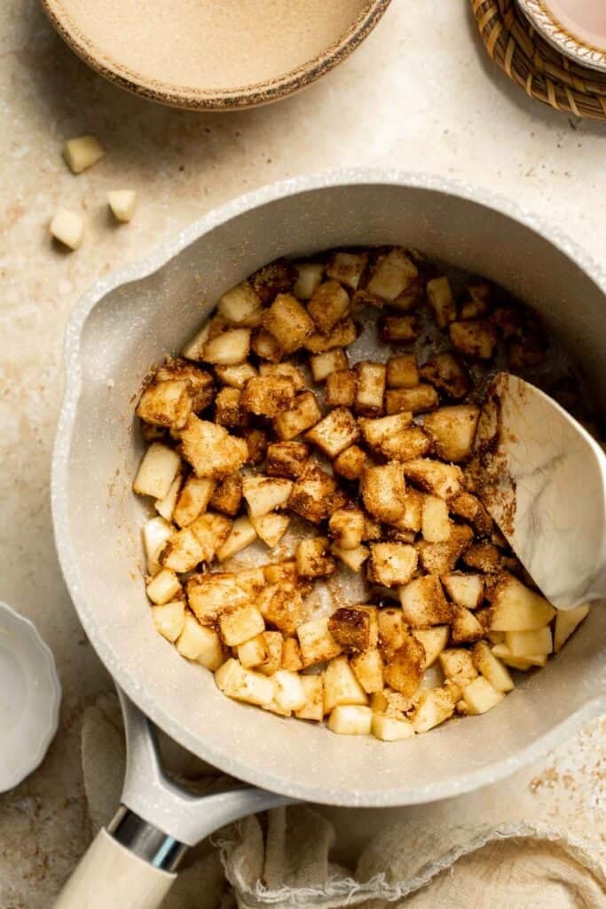 Add a touch of sweetness to your breakfast or dessert with this easy caramelized apple topping recipe. Perfect for pancakes, waffles, ice cream, and more! | aheadofthyme.com