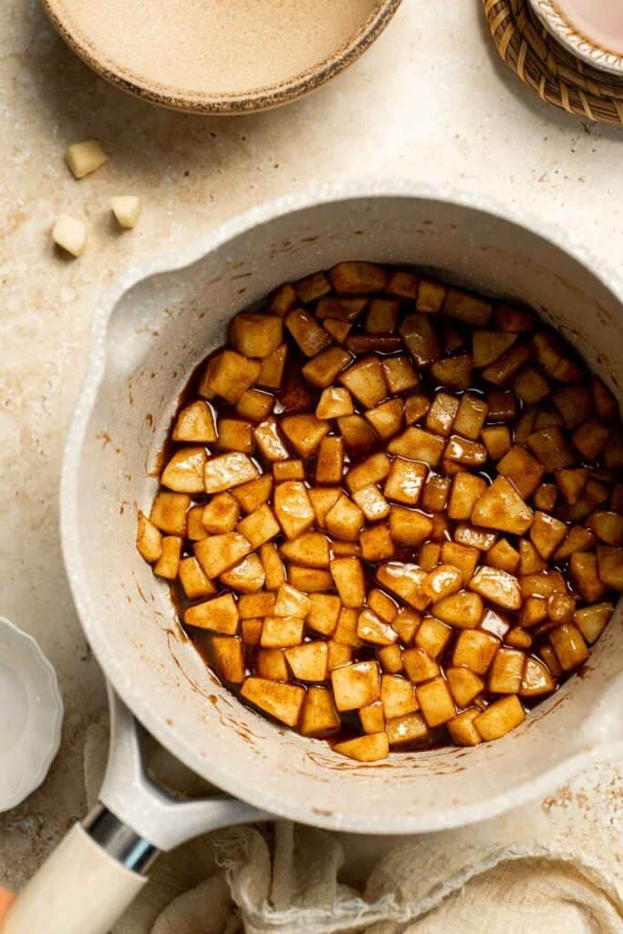 Add a touch of sweetness to your breakfast or dessert with this easy caramelized apple topping recipe. Perfect for pancakes, waffles, ice cream, and more! | aheadofthyme.com