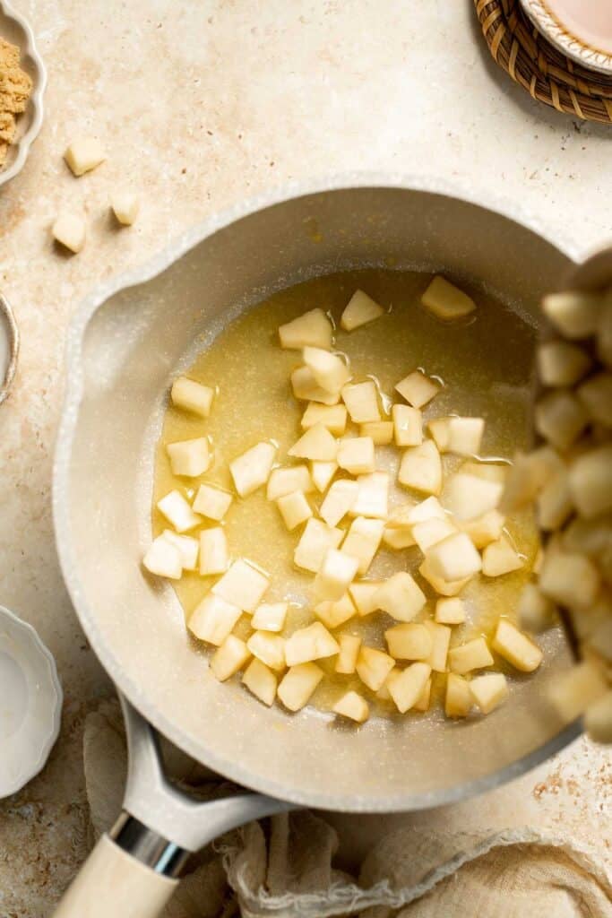 Add a touch of sweetness to your breakfast or dessert with this easy caramelized apple topping recipe. Perfect for pancakes, waffles, ice cream, and more! | aheadofthyme.com