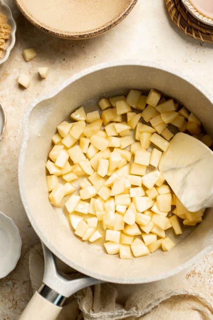 Add a touch of sweetness to your breakfast or dessert with this easy caramelized apple topping recipe. Perfect for pancakes, waffles, ice cream, and more! | aheadofthyme.com