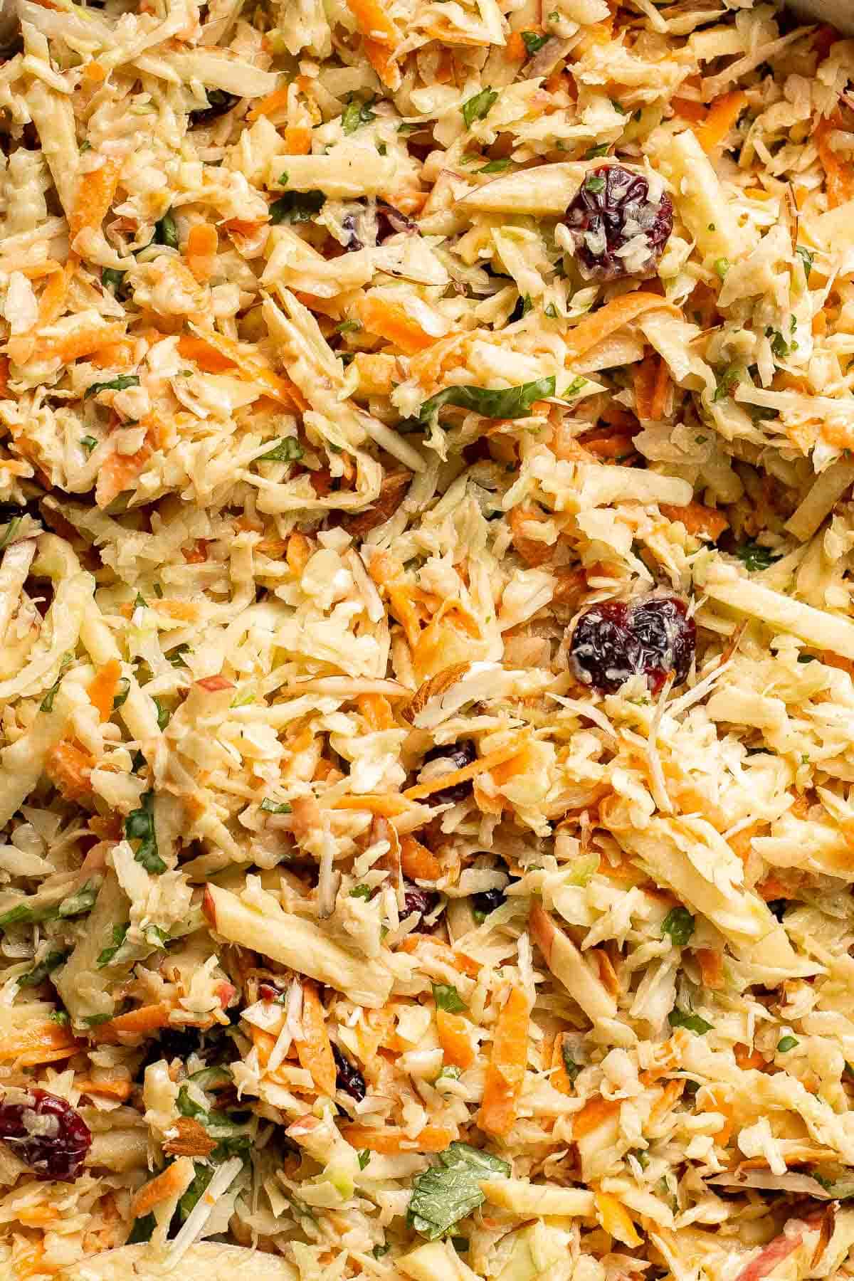 This easy apple slaw recipe is the perfect combination of crisp apples, crunchy cabbage, and a creamy dressing. A fresh side dish ready in 10 minutes! | aheadofthyme.com