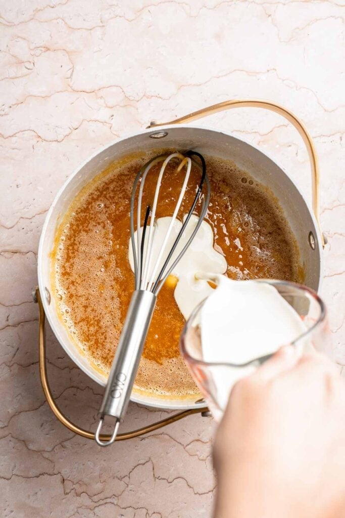 Homemade Caramel Apple Pie is warm, spiced, and gooey. A classic apple pie with caramel sauce baked inside for the ultimate fall dessert. | aheadofthyme.com