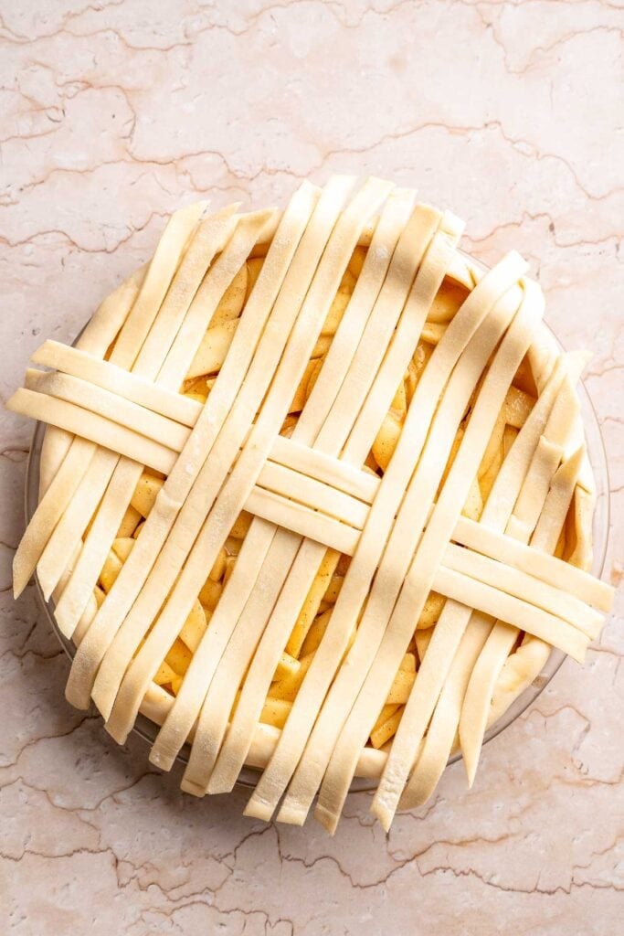 Homemade Caramel Apple Pie is warm, spiced, and gooey. A classic apple pie with caramel sauce baked inside for the ultimate fall dessert. | aheadofthyme.com