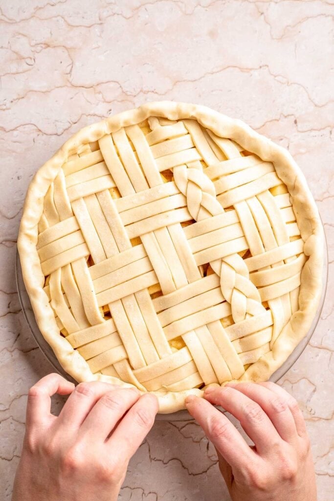 Homemade Caramel Apple Pie is warm, spiced, and gooey. A classic apple pie with caramel sauce baked inside for the ultimate fall dessert. | aheadofthyme.com