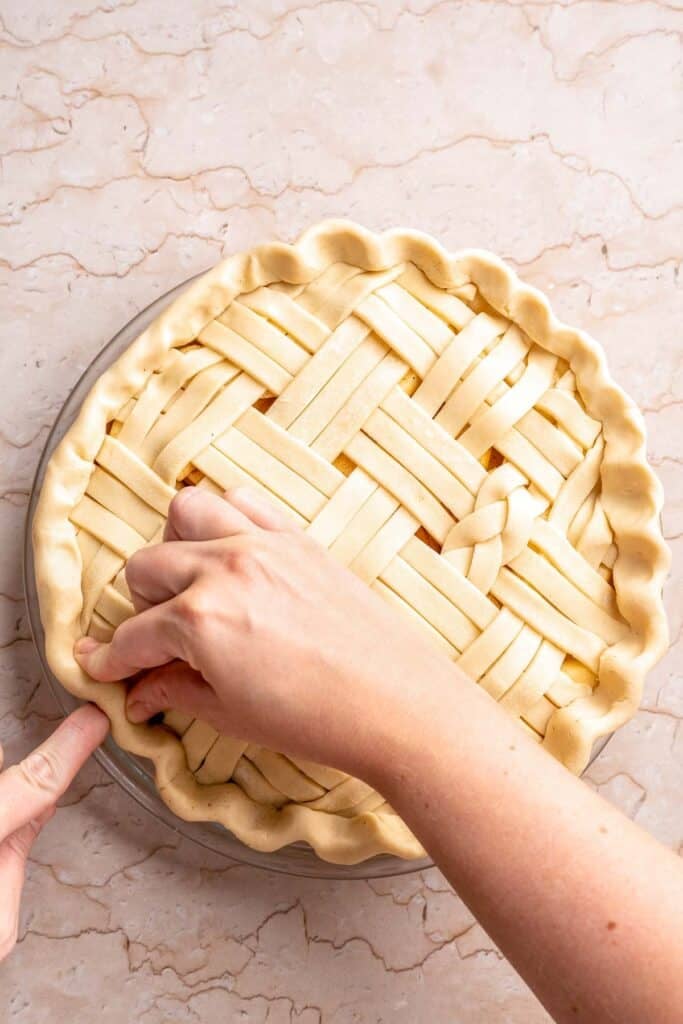 Homemade Caramel Apple Pie is warm, spiced, and gooey. A classic apple pie with caramel sauce baked inside for the ultimate fall dessert. | aheadofthyme.com