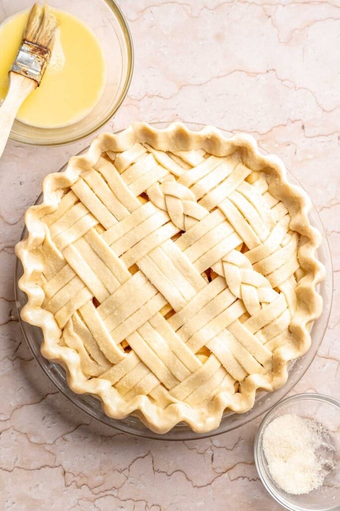 Homemade Caramel Apple Pie is warm, spiced, and gooey. A classic apple pie with caramel sauce baked inside for the ultimate fall dessert. | aheadofthyme.com