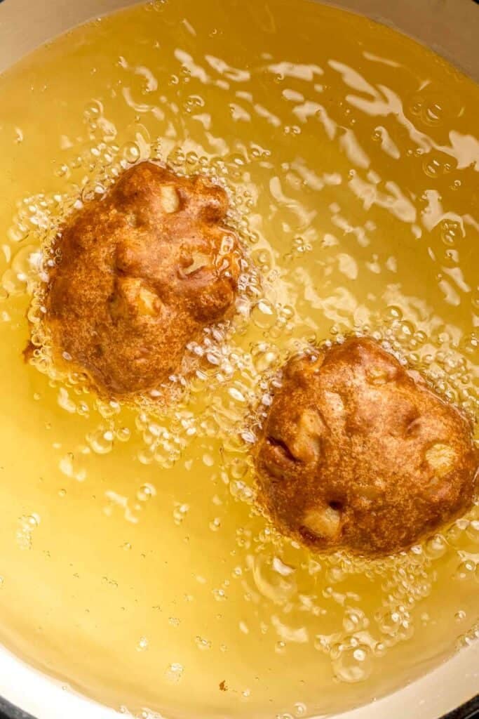 Old fashioned apple fritters are crispy, fluffy, and packed with juicy apples, warm spices, and a sweet glaze. A bakery-style treat at home! | aheadofthyme.com