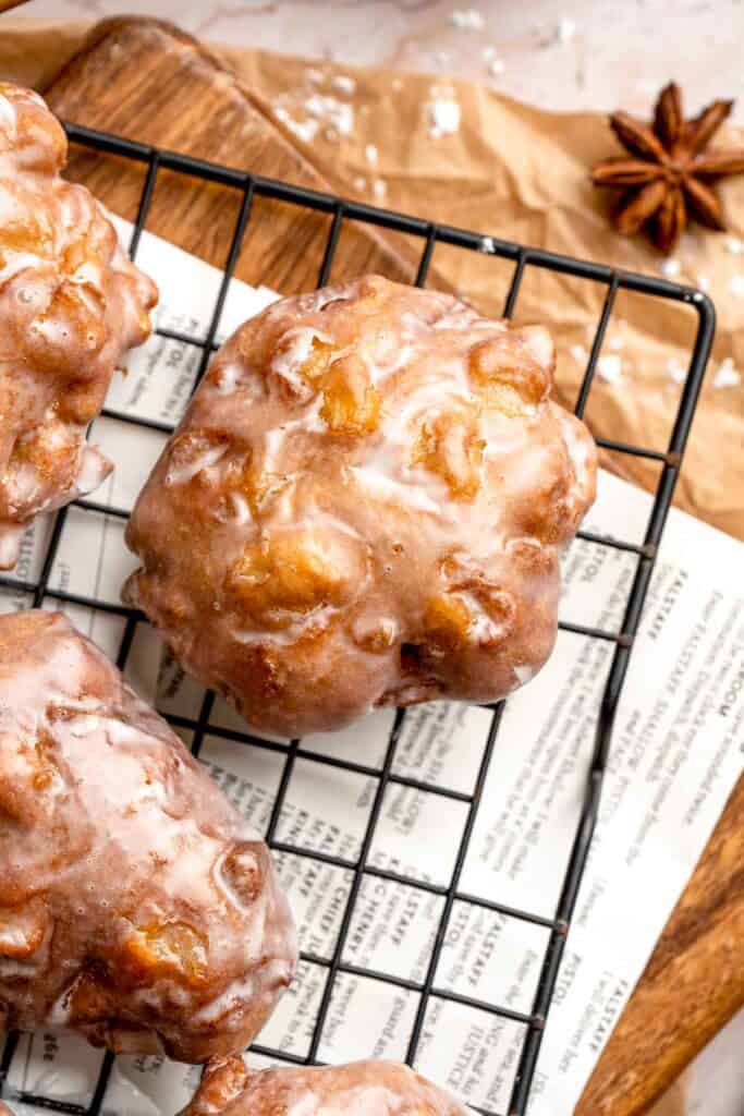 Old fashioned apple fritters are crispy, fluffy, and packed with juicy apples, warm spices, and a sweet glaze. A bakery-style treat at home! | aheadofthyme.com