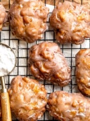 Old fashioned apple fritters are crispy, fluffy, and packed with juicy apples, warm spices, and a sweet glaze. A bakery-style treat at home! | aheadofthyme.com