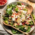 Pomegranate pear salad with walnuts, tangy cheese, and honey balsamic dressing is fresh, colorful, and perfect for holidays or everyday meals. | aheadofthyme.com