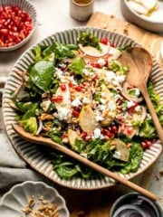 Pomegranate pear salad with walnuts, tangy cheese, and honey balsamic dressing is fresh, colorful, and perfect for holidays or everyday meals. | aheadofthyme.com