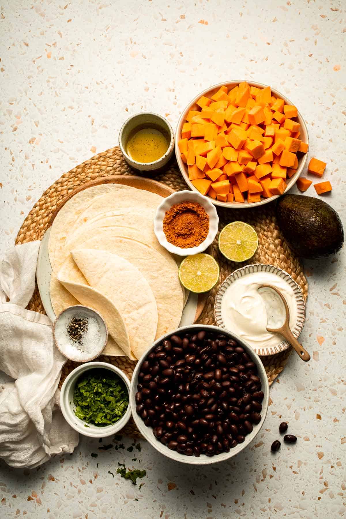 Spice up taco night with these delicious Sweet Potato and Black Bean Tacos. A quick and healthy vegetarian dinner ready in under 30 minutes. | aheadofthyme.com