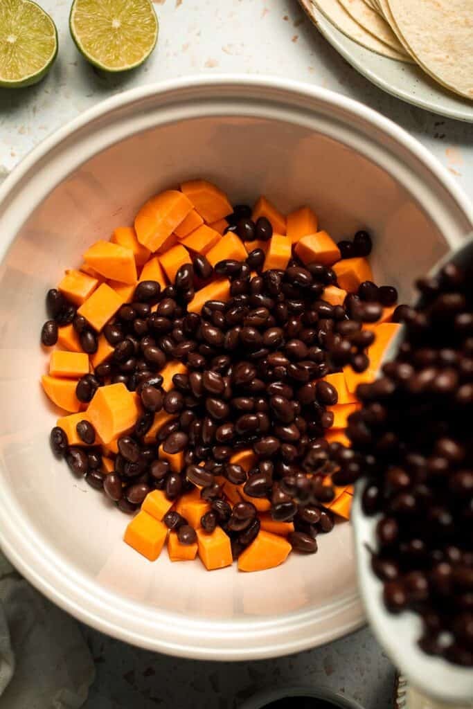Spice up taco night with these delicious Sweet Potato and Black Bean Tacos. A quick and healthy vegetarian dinner ready in under 30 minutes. | aheadofthyme.com