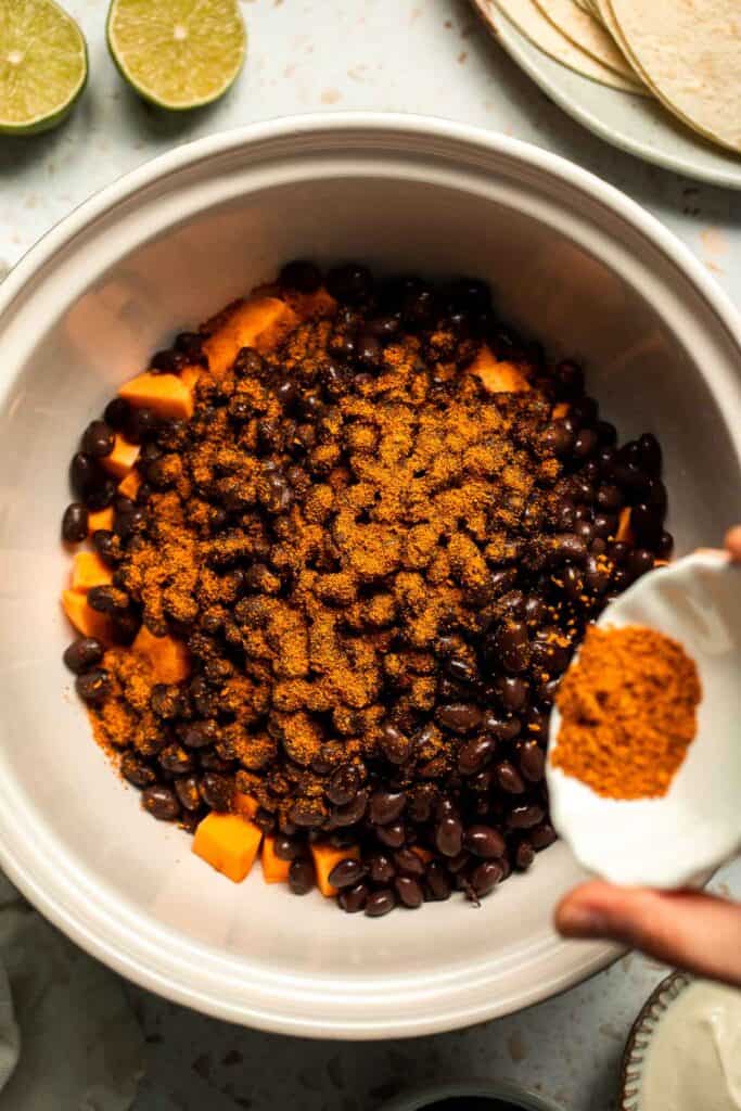 Spice up taco night with these delicious Sweet Potato and Black Bean Tacos. A quick and healthy vegetarian dinner ready in under 30 minutes. | aheadofthyme.com