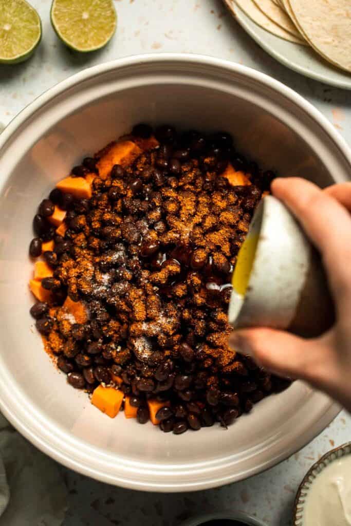 Spice up taco night with these delicious Sweet Potato and Black Bean Tacos. A quick and healthy vegetarian dinner ready in under 30 minutes. | aheadofthyme.com