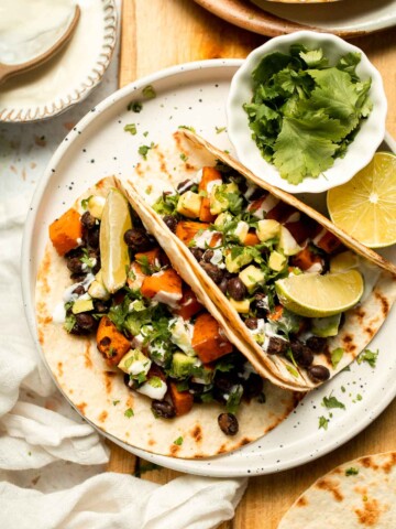 Spice up taco night with these delicious Sweet Potato and Black Bean Tacos. A quick and healthy vegetarian dinner ready in under 30 minutes. | aheadofthyme.com