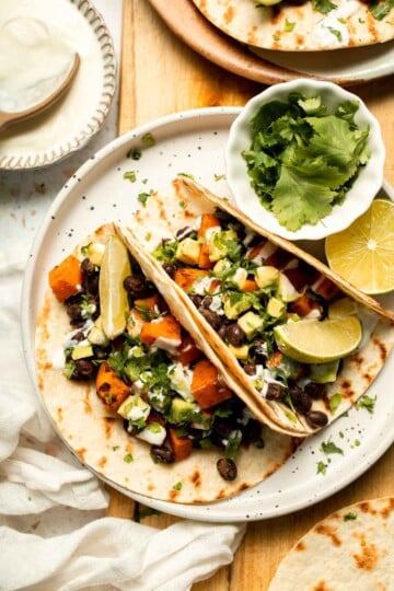 Spice up taco night with these delicious Sweet Potato and Black Bean Tacos. A quick and healthy vegetarian dinner ready in under 30 minutes. | aheadofthyme.com