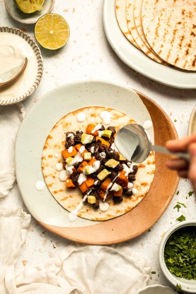 Spice up taco night with these delicious Sweet Potato and Black Bean Tacos. A quick and healthy vegetarian dinner ready in under 30 minutes. | aheadofthyme.com